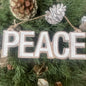 Peace Carved Christmas Ornament